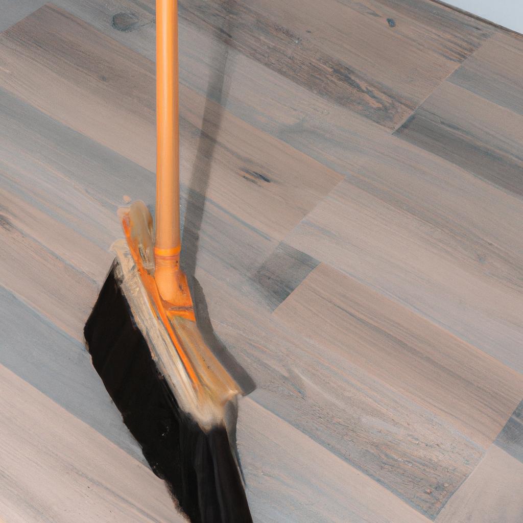 A broom with soft bristles is ideal for cleaning hardwood floors without scratching them